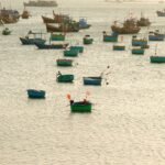 small fishing boats on the water